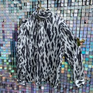 Vintage 80’s shoulder padded drape neck long sleeve blouse.